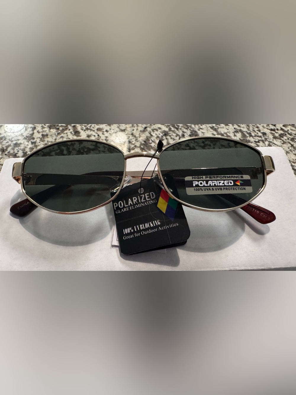 Polarized Oval Sunglasses with Green Lenses and Gold Frame